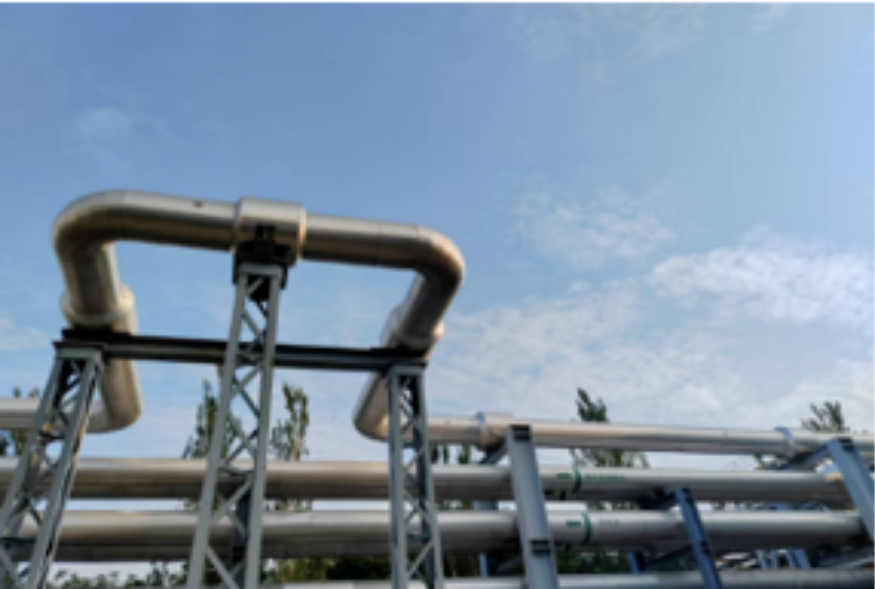 Overhead steam distribution pipelines with aerogel blanket insulation